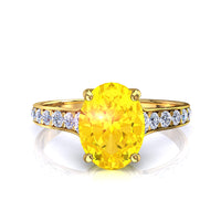 Solitario zaffiro giallo ovale e diamanti tondi Cindirella in oro giallo 0.60 carati