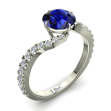 Adriana 0.80 carat round sapphire and round diamond ring
