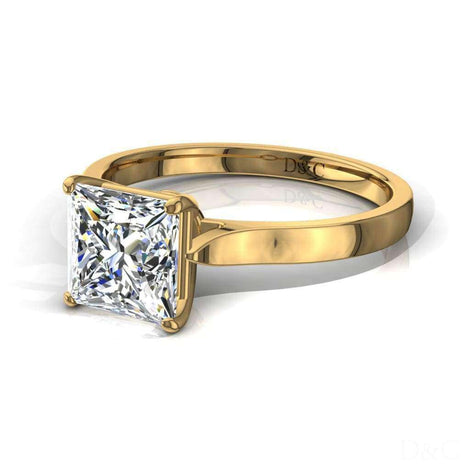 Diamante solitario Princess Capucine in oro giallo 0.80 carati