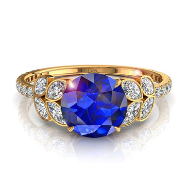 Round sapphire and marquise diamond solitaire and round diamonds 1.00 carat Angela A / SI / 18 carat Yellow Gold